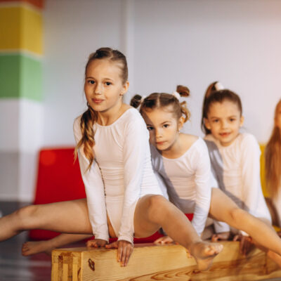 Group of girls exercising at gymnastic school Group of girls exercising at gymnastic school